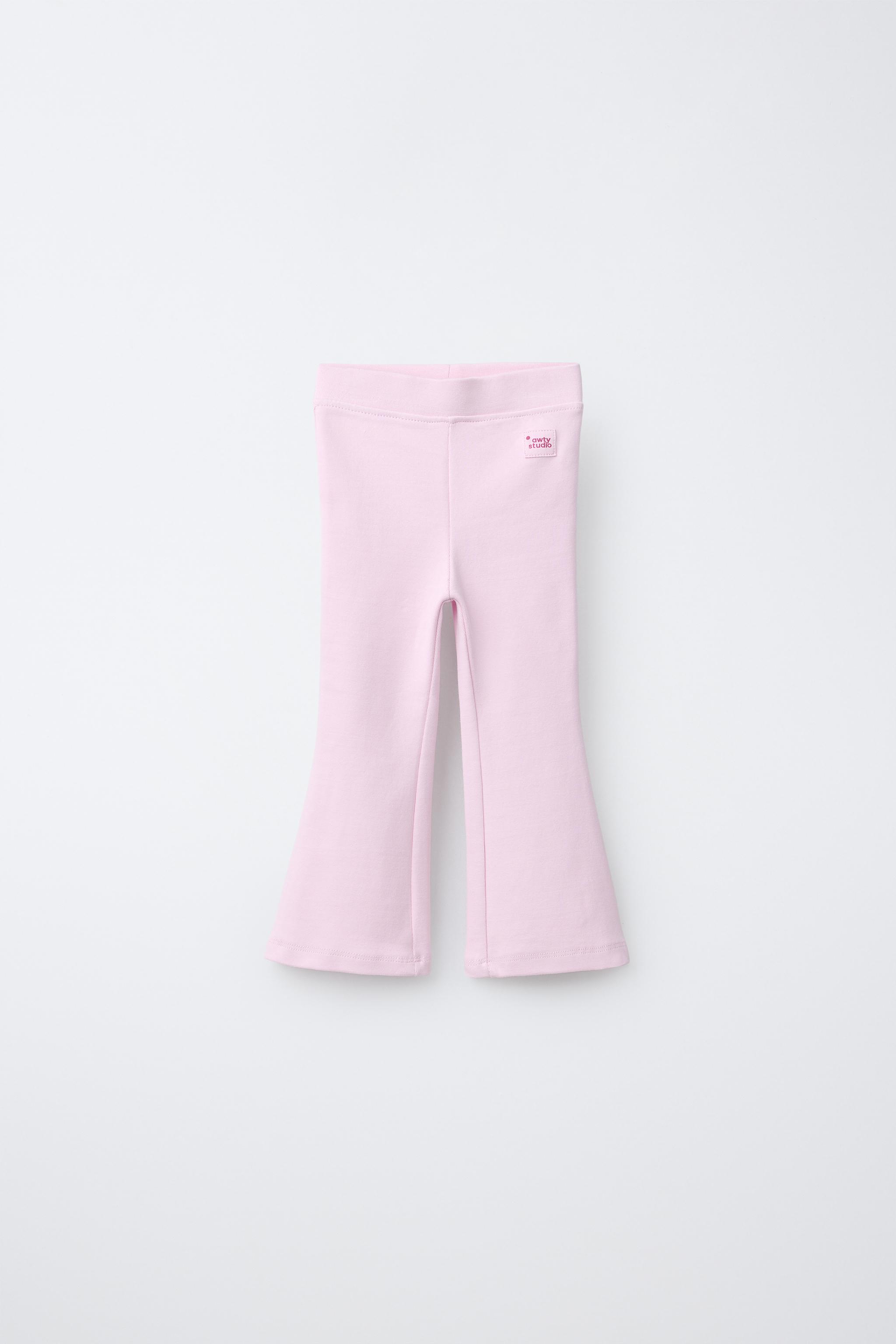 LEGGING FLARE INTERLOCK DÉCOR ÉTIQUETTE